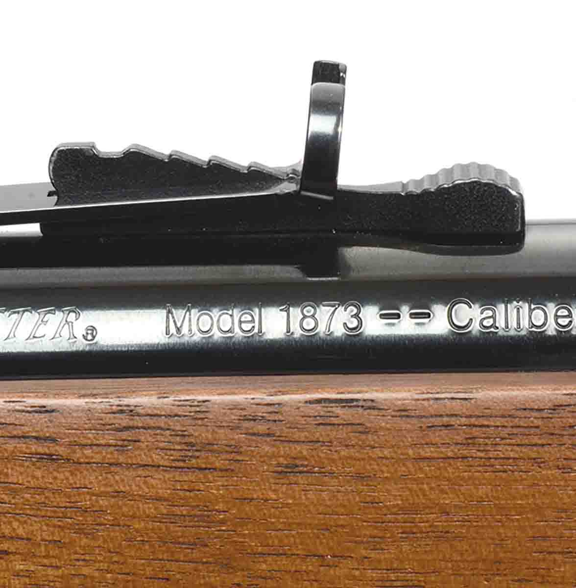 Its standard rear sight is a buckhorn with notched slider for elevation adjustment.